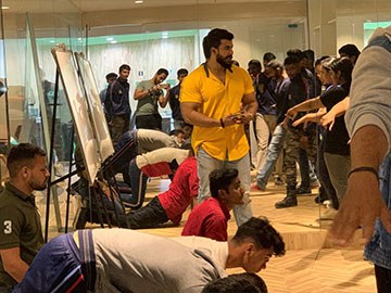 women training rocks fitness guru